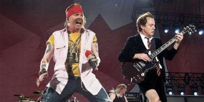 Axl Rose performing as the frontman of AC/DC