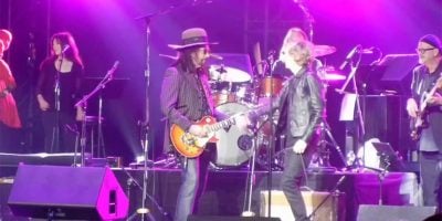 Mike Campbell of The Heartbreakers performing live alongside Beck