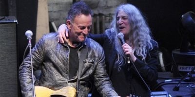 Patti Smith performing alongside Bruce Springsteen in New York