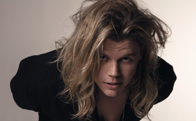 conrad-sewell-2018 leaning forward