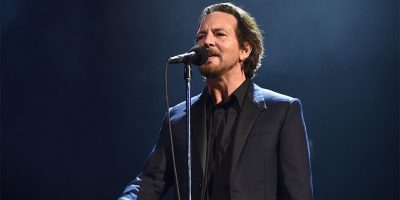 Pearl Jam frontman Eddie Vedder performing live