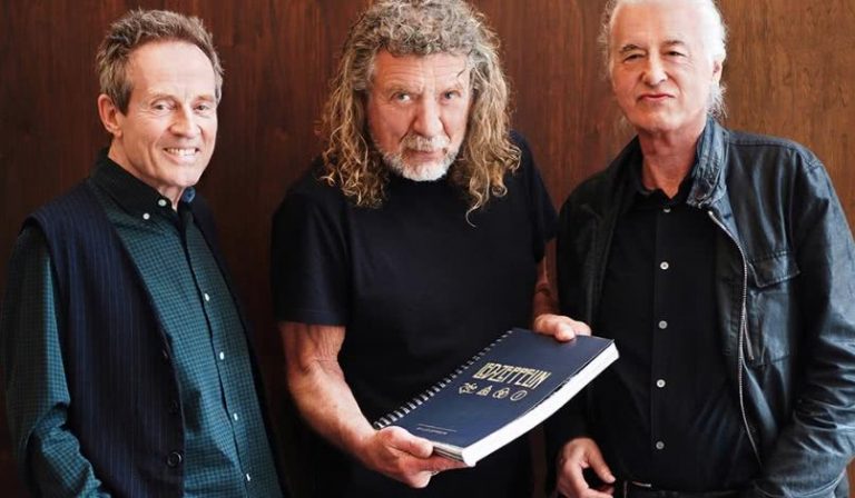 Led Zeppelin with their 400-page book