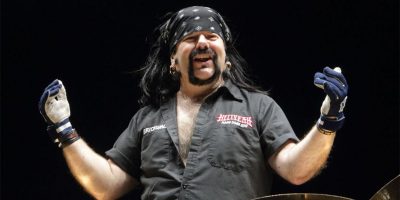 Vinnie Paul, the drummer of Pantera, Damageplan, and Hellyeah, performing live