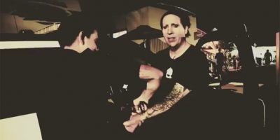 Image of Marilyn Manson being 'arrested' by US police