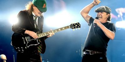 AC/DC's Angus Young and Brian Johnson performing live.