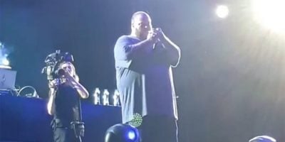 Action Bronson smoking onstage in Kosovo.