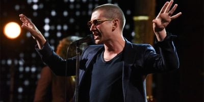 Alex Turner of the Arctic Monkeys performing live