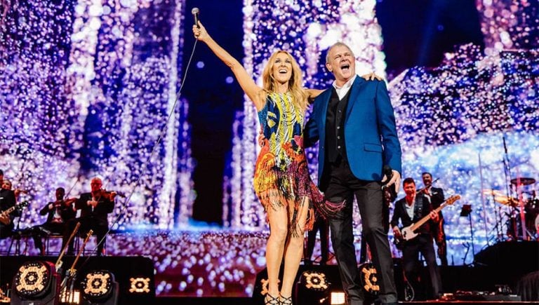 Céline Dion performing onstage with John Farnham