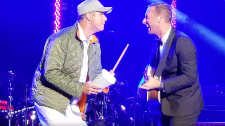 Will Ferrell playing the cowbell alongside Coldplay's Chris Martin