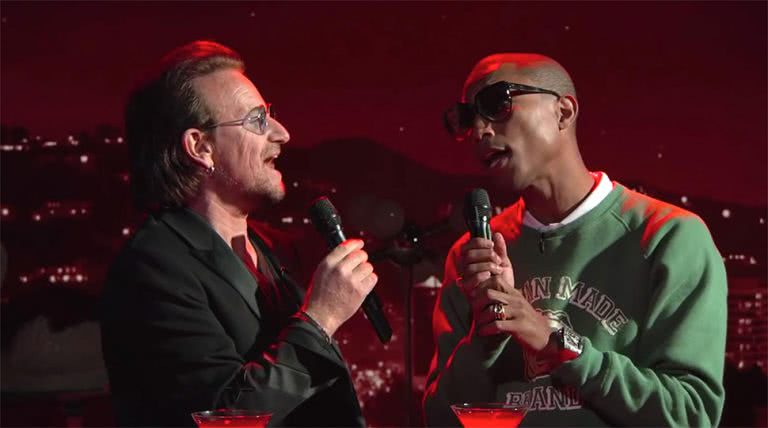 Bono and Pharrell performing a cover of the Bee Gees' 'Staying Alive' for 'Jimmy Kimmel Live!'