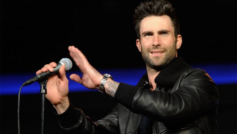 Adam Levine of Maroon 5 performing live