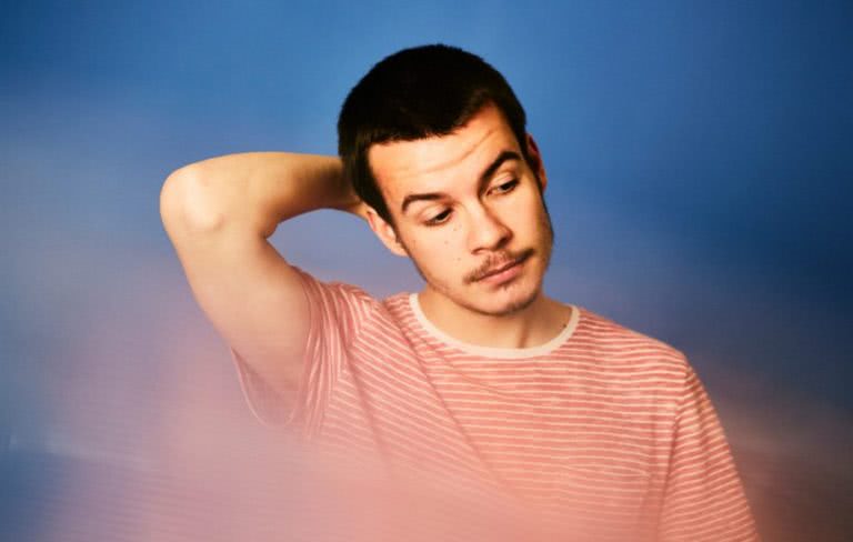 REX ORANGE COUNTY red striped shirt blue background