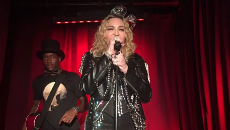 Madonna performing at New York City's Stonewall Inn with son David Banda