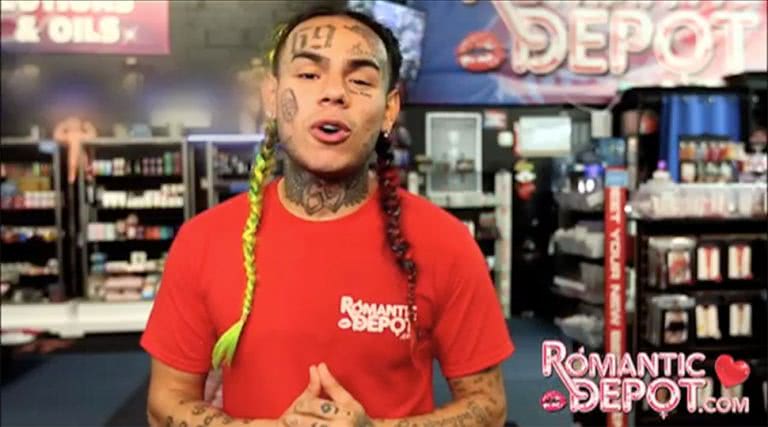 Image of controversial artist Tekashi 6ix9ine in an anti-abuse ad for a New York sex shop