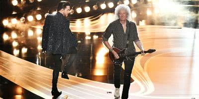 Adam Lambert and Brian May of Queen performing at the Oscars