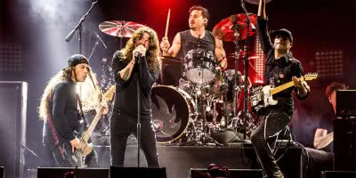 Members of Foo Fighters, Metallica, and Rage Against The Machine performing as part of Audioslave as a tribute to Chris Cornell