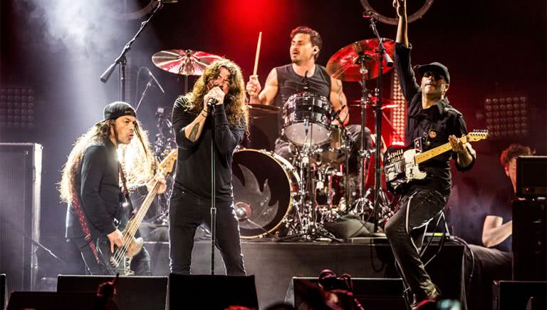 Members of Foo Fighters, Metallica, and Rage Against The Machine performing as part of Audioslave as a tribute to Chris Cornell