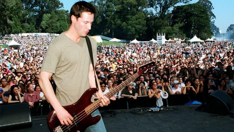 Keanu Reeves performing with his former rock band Dogstar