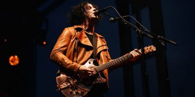 Jack White performing with The Raconteurs
