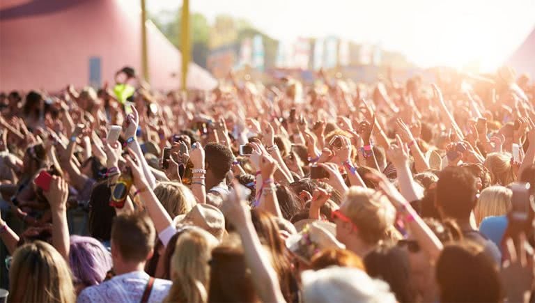 Image of a festival crowd, much like the one you'll see at Land Of Plenty