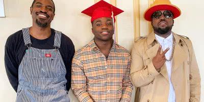 Outkast members André 3000 and Big Boi with the latter's son, Cross