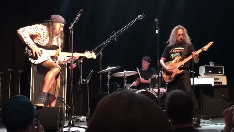 Kirk Hammett and Robert Trujilo of Metallica performing as part of The Wedding Band