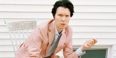 alex cameron press pic pink suit