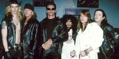 Image of Guns N' Roses with Arnold Schwarzenegger while supporting 'Terminator 2: Judgement Day'