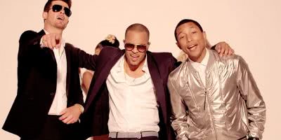 Image of Robin Thicke, T.I., and Pharrell Williams in the film clip for 'Blurred Lines'