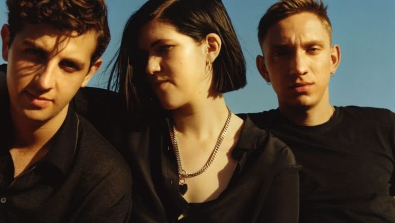 English indie pop collective The xx featuring Romy Madley Croft in the centre