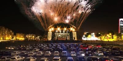 Photo of a drive-in concert.