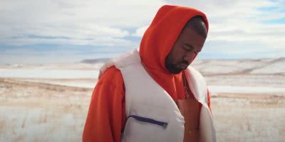 DONDA Kanye West standing in desert in Follow God music video