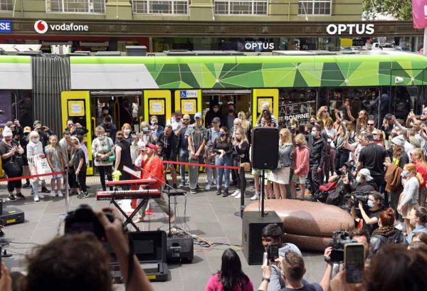 Tones and I busking in Melbourne