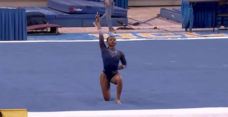 Gymnast Nia Dennis performs to Kendrick Lamar and Tupac