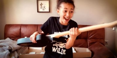 Nandi Bushell is given a guitar for Muse cover