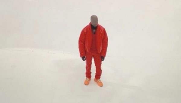 Kanye West and Kim Kardashian rock matching red to 'DONDA