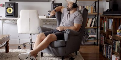 Seth Sentry listening to Yamaha YH-L700A wireless headphones