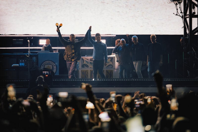 Oasis performing live in Cardiff, Wales