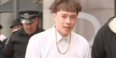 Skux, Logan Cudarans, outside court