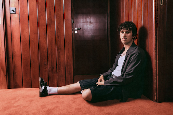 Arthur Hill posing against a wall
