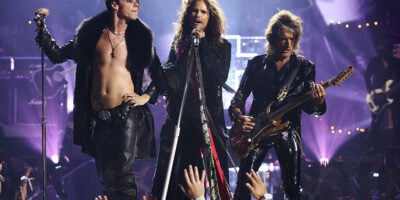 Yungblud, Steven Tyler and Joe Perry perform during a tribute to Ozzy Osbourne at the 2025 VMAs