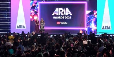 SYDNEY, AUSTRALIA - NOVEMBER 20: Annabelle Herd, CEO of ARIA and ARIA chair Natalie Waller speak onstage during the 2024 ARIA Awards at Hordern Pavilion on November 20, 2024 in Sydney, Australia. (Photo by Wendell Teodoro/Getty Images)
