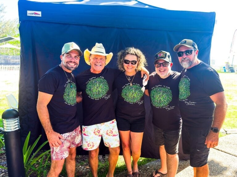 Troy Casser-Daley and his team sporting his merch