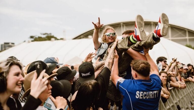 A fan crowdsurfing at Good Things