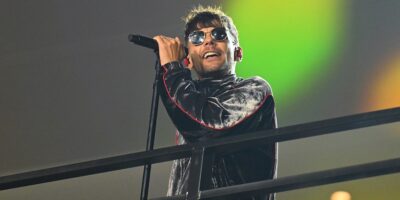 LAS VEGAS, NEVADA - NOVEMBER 22: Louis Tomlinson performs on stage prior to the F1 Grand Prix of Las Vegas at Las Vegas Strip Circuit on November 22, 2025 in Las Vegas, Nevada. (Photo by Mark Sutton - Formula 1/Formula 1 via Getty Images)
