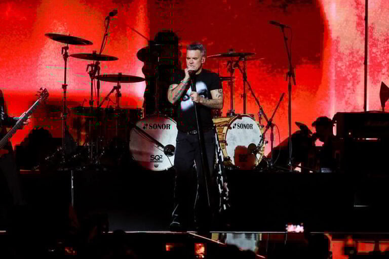 Robbie Williams performs at the 2026 Brit Awards