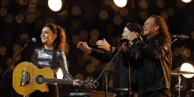 Amy Shark, Dave Gleeson and Phil Jamieson at the 2026 NRL Grand Final