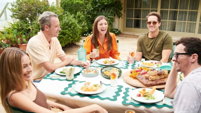 People sitting around a table eating