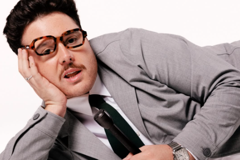 Mitch Churi with a microphone