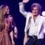 Rod Stewart waves at crowd